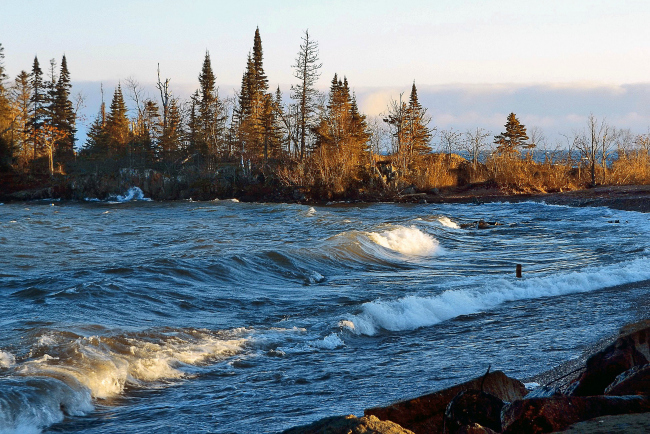 Lake Superior in afternoon light with waves crashing
